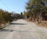Mining Community Gravel Road after EBS Surface Seal dust Control for gravel roads