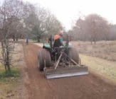 final shaping of the surface with tractor and box blade alternative grading method