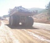Mine Haul Truck Traffic over Durasolution treated road Fugitive Dust Abatement Technology