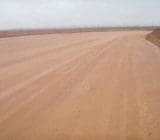 Properly prepared wearing course surface of a haul road diversion