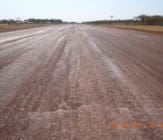 Curing of EBS after surface seal of gravel airstrip